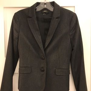Woman’s work suit (including jacket and pants)